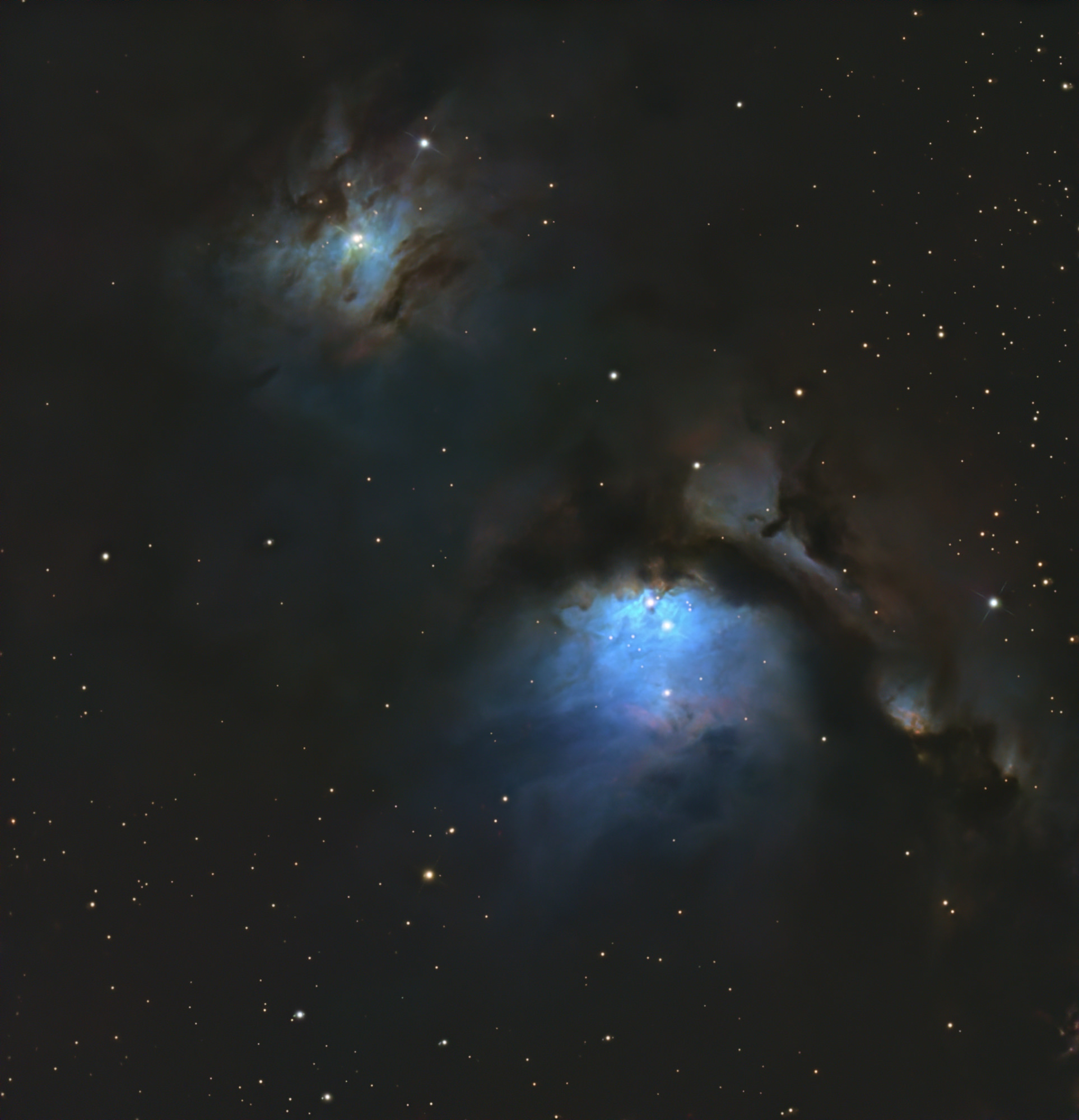 Reflection nebula Messier 78 lower right and NGC 2071 upper left in the constellation Orion.